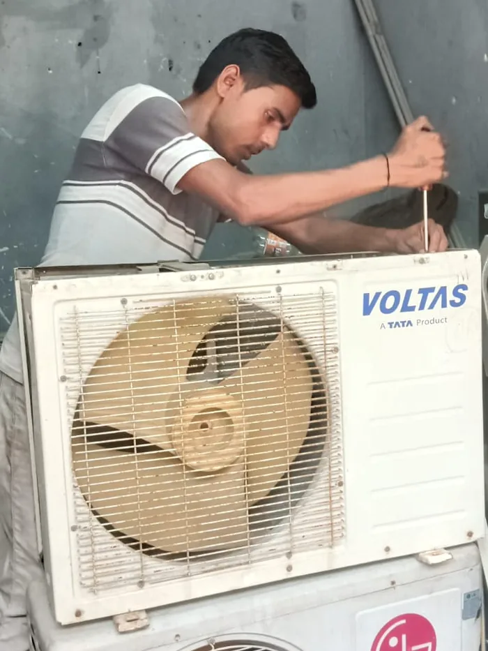 Vayu AC Service technician completing AC installation in Greater Noida