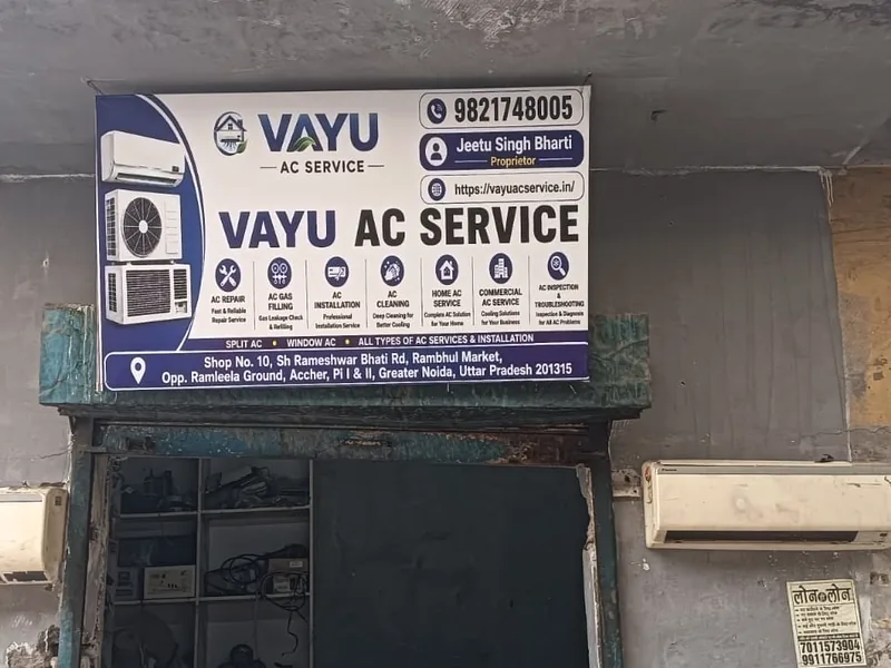Vayu AC Service sign board with address and contact details in Greater Noida