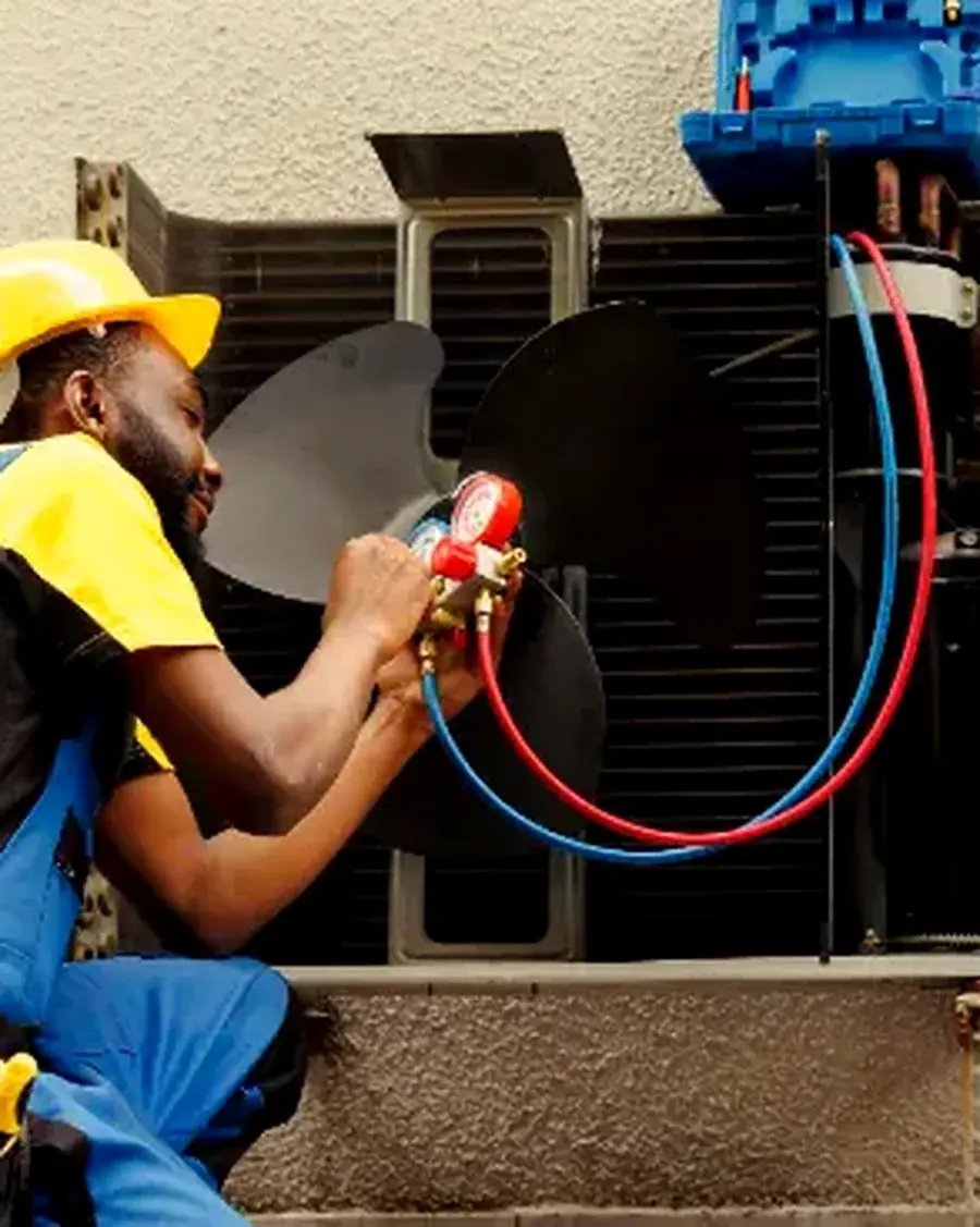 Vayu AC Service technician checking an outdoor AC unit for a local customer in Greater Noida