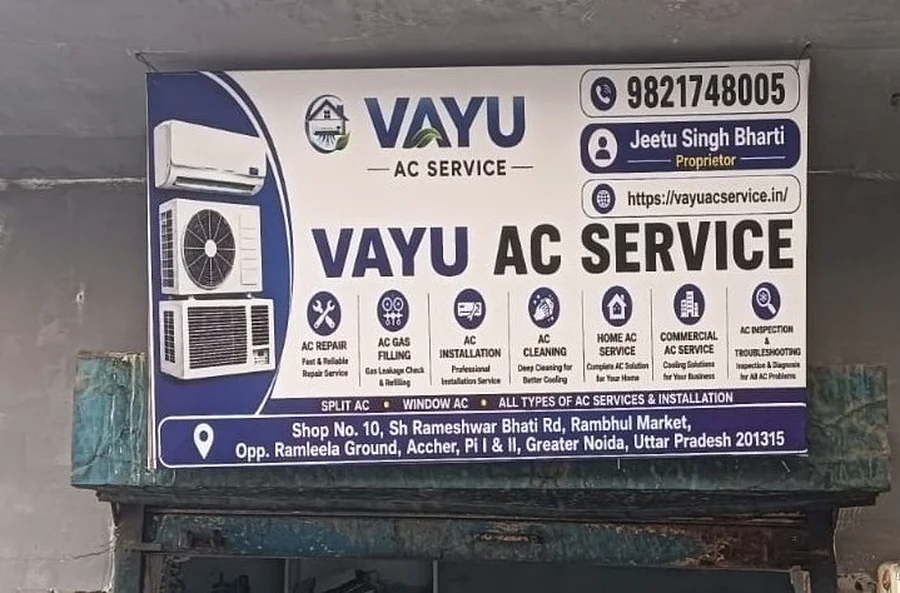 Vayu AC Service sign board showing all services, phone number, and address in Greater Noida